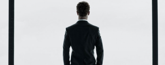 First high resolution theatrical poster for FIFTY SHADES OF GREY has its back the audience